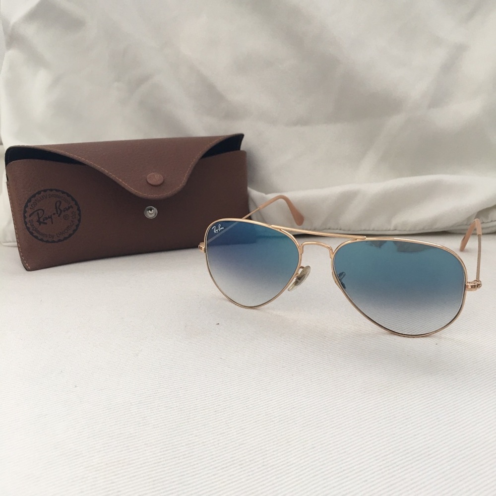 Rayban classic aviators. Gold rim, blueish lenses